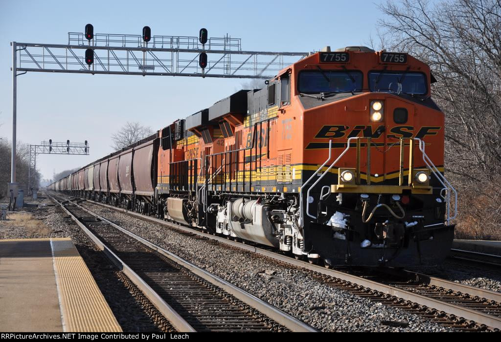 Grain train rolls east